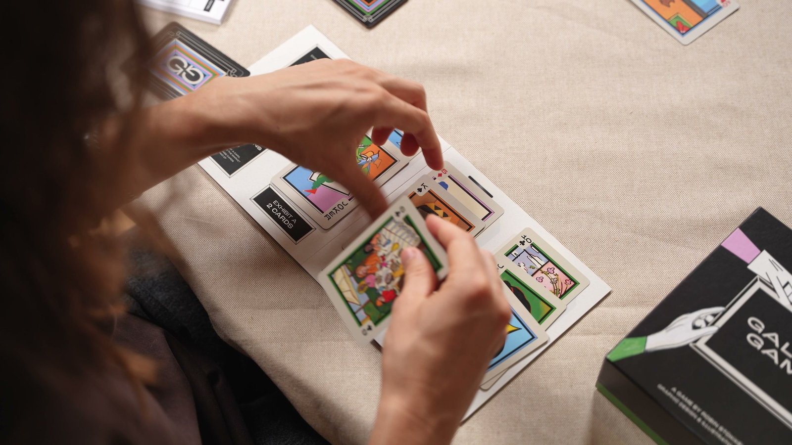 A player rearranges the cards on their player board.